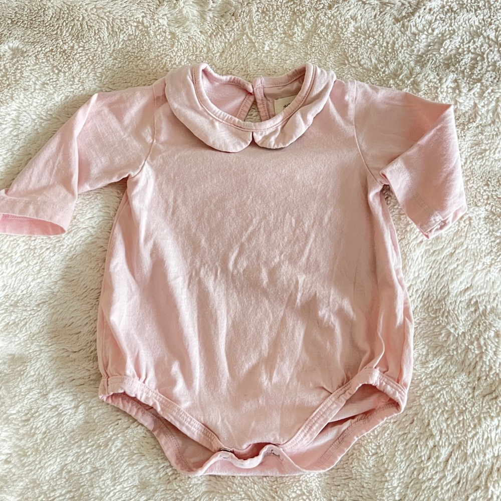Hazel Village pink onesie w/ Liberty of London print color. 0-6months.